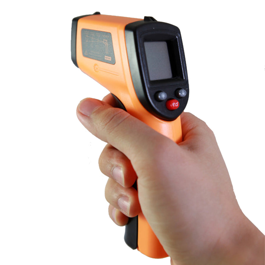 A photograph of the NTS Water Stress Meter being held in hand on white background